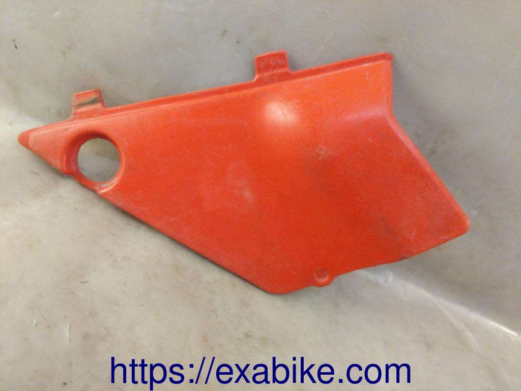 cache latéral gauche Honda MT 80 - photo 1