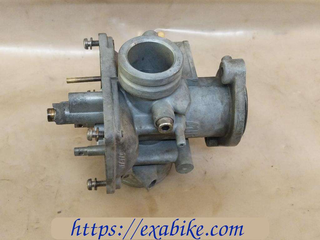 carburetor body, left Suzuki GT 380 - photo 1