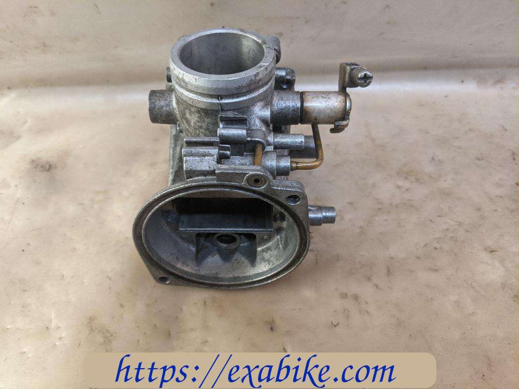 carburetor body, left Suzuki GSE 500 - photo 2