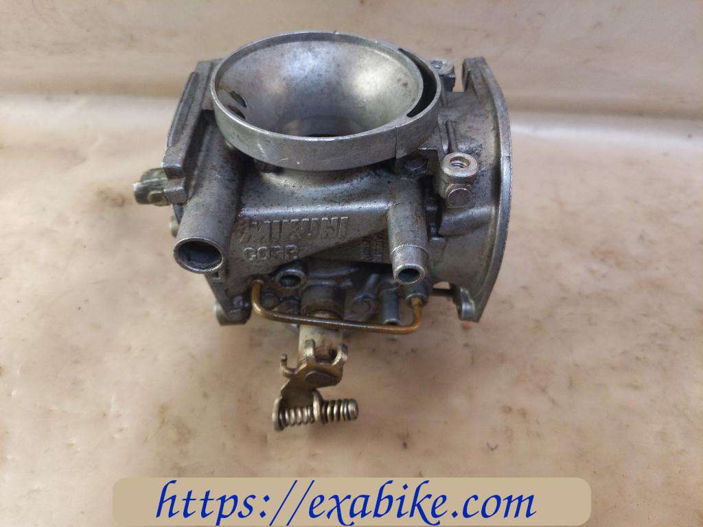carburetor body, left Suzuki GSE 500 - photo 4